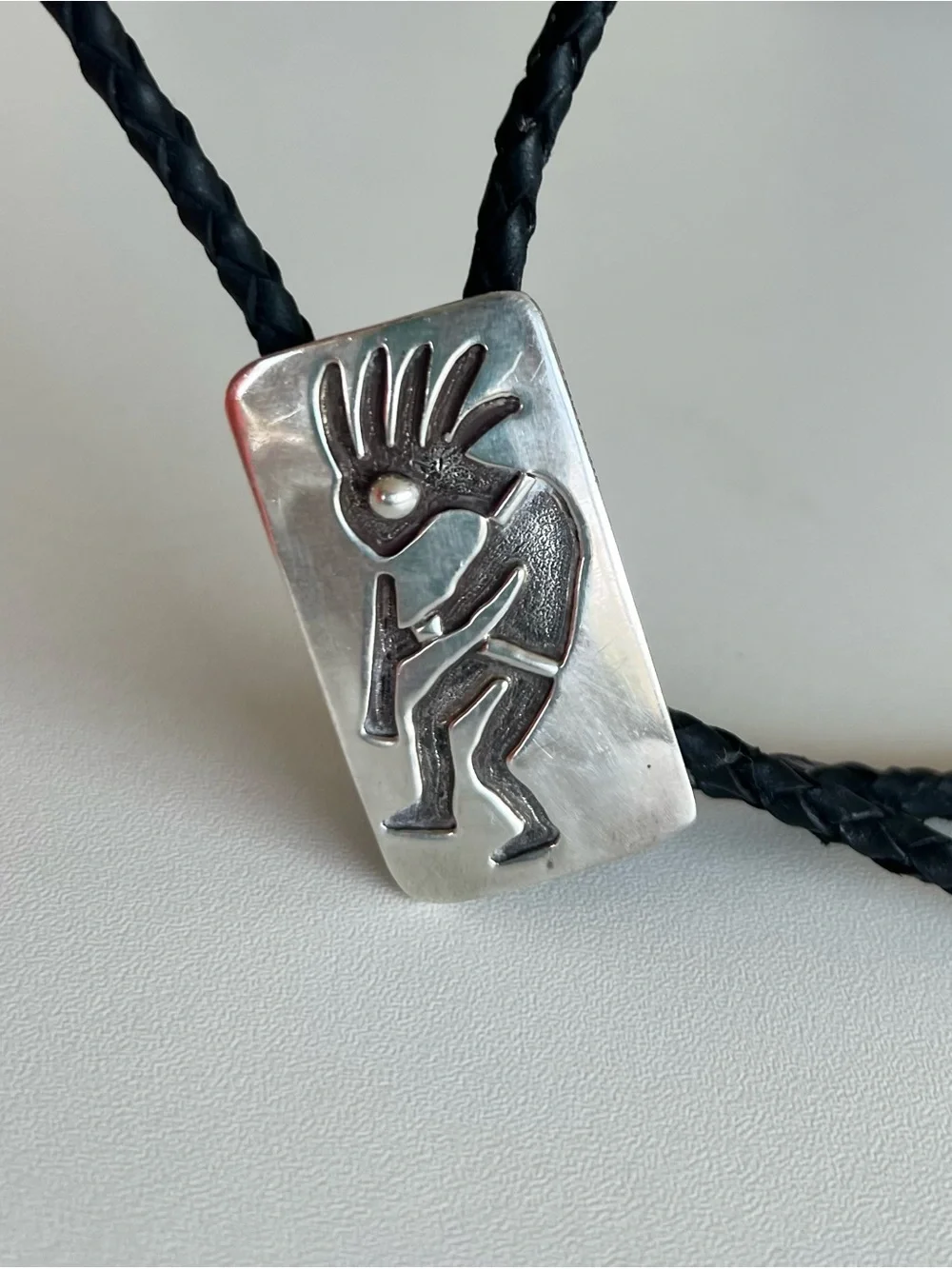 Navajo Sterling Silver Kokapeli Black Leather Bolo Tie